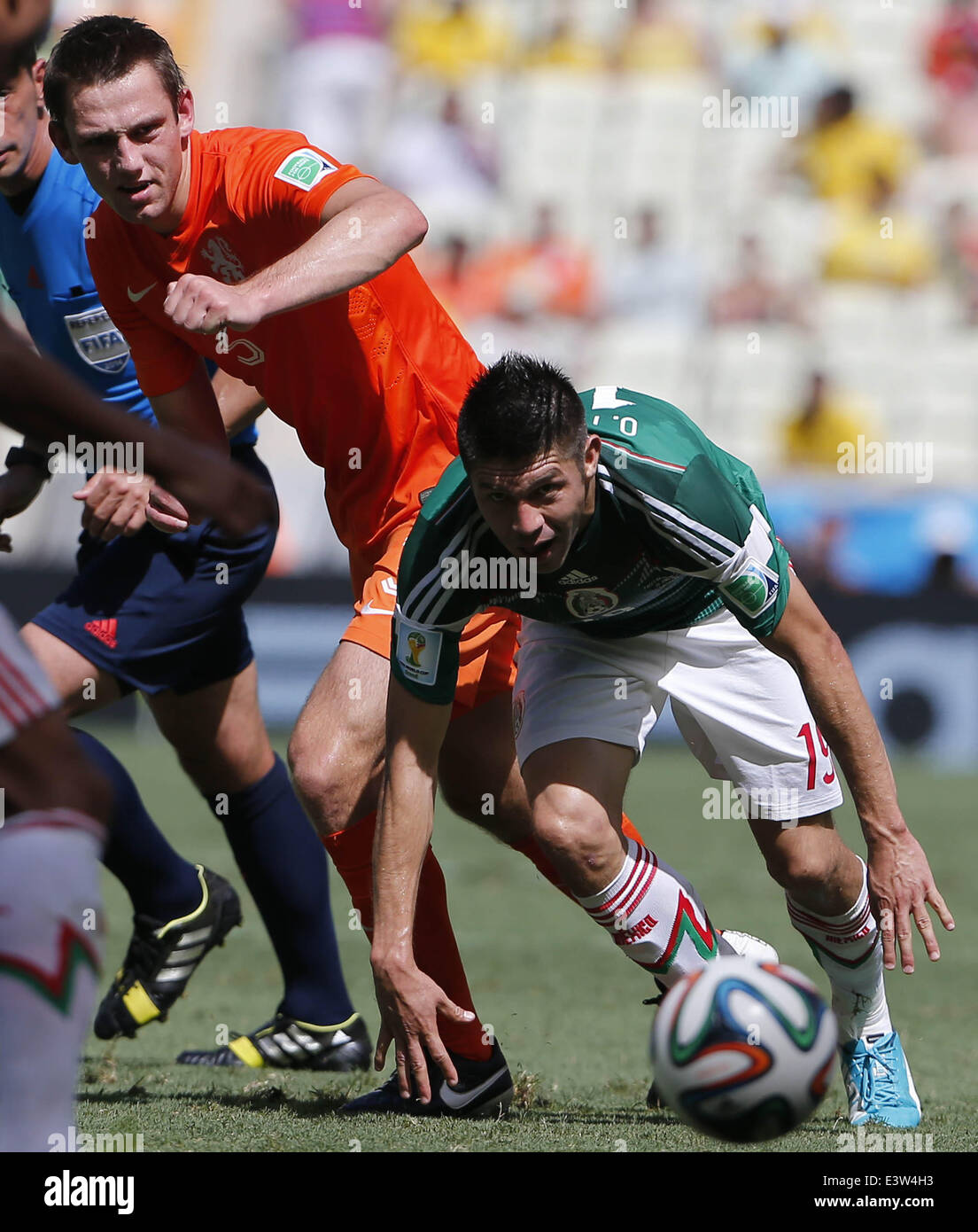 Fortaleza, Brazil. 29th June, 2014. Mexico's Oribe Peralta vies for the ball during a Round of 16 match between Netherlands and Mexico of 2014 FIFA World Cup at the Estadio Castelao Stadium in Fortaleza, Brazil, on June 29, 2014. Credit:  Zhou Lei/Xinhua/Alamy Live News Stock Photo