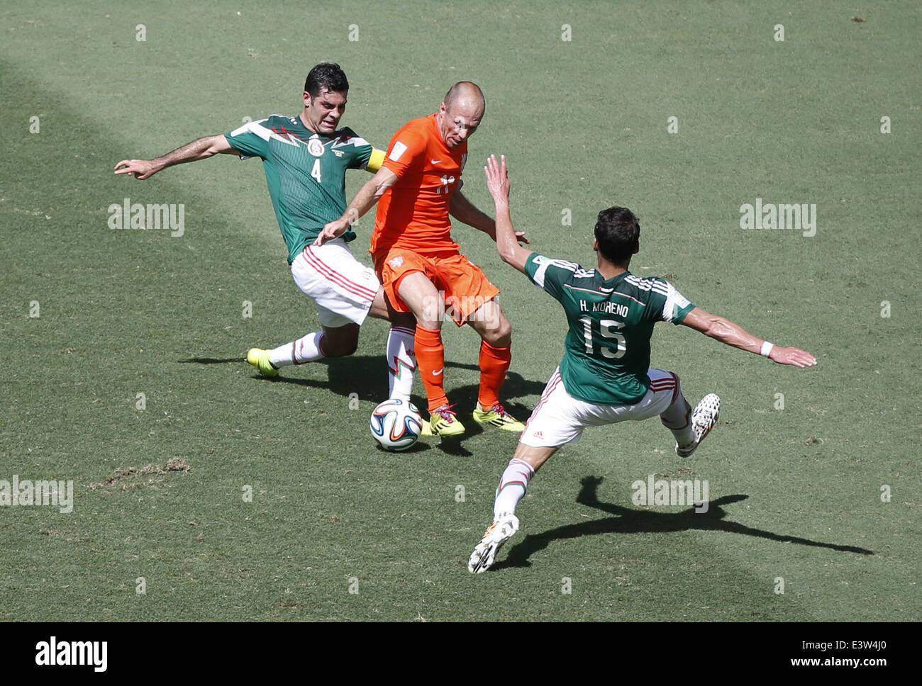 Fortaleza, Brazil. 29th June, 2014. Netherlands' Arjen Robben (C) vies with Mexico's Rafael Marquez (L) and Hector Moreno during a Round of 16 match between Netherlands and Mexico of 2014 FIFA World Cup at the Estadio Castelao Stadium in Fortaleza, Brazil, on June 29, 2014. Credit:  Liao Yujie/Xinhua/Alamy Live News Stock Photo