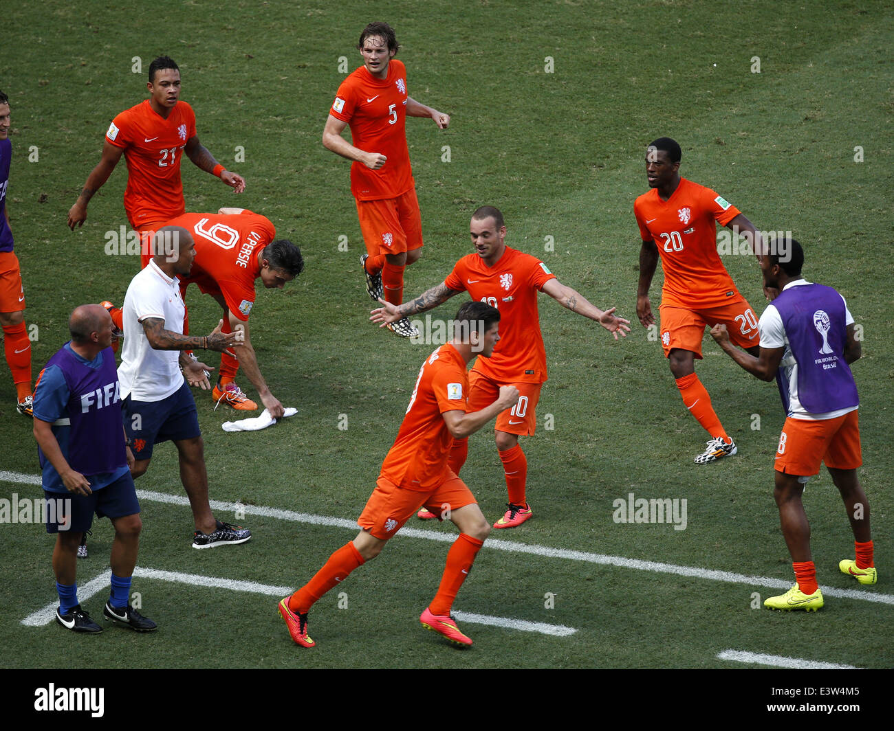 (140629) -- FORTALEZA, June 29, 2014 (Xinhua) -- Netherlands' Wesley Sneijder (3rd R) celebrates a goal with teammates during a Round of 16 match between Netherlands and Mexico of 2014 FIFA World Cup at the Estadio Castelao Stadium in Fortaleza, Brazil, on June 29, 2014. Netherlands won 2-1 over Mexico and qualified for Quarter-finals on Sunday. (Xinhua/Liao Yujie)(pcy) Stock Photo