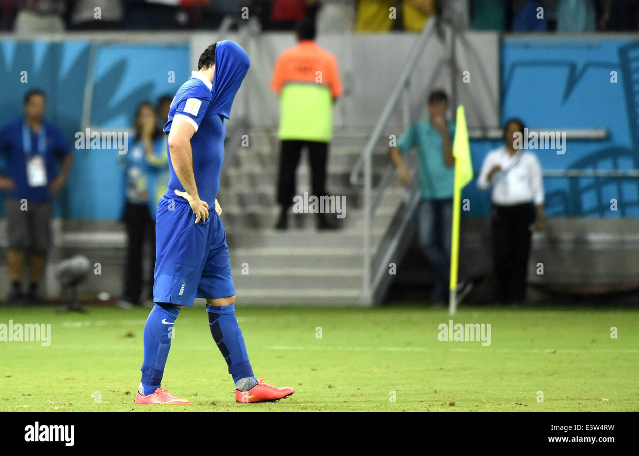 (140629) -- RECIFE, June 29, 2014 (Xinhua) -- Greece's Theofanis Gekas reacts after missing a penalty kick during the penalty shoot-out of a Round of 16 match between Costa Rica and Greece of 2014 FIFA World Cup at the Arena Pernambuco Stadium in Recife, Brazil, on June 29, 2014. Costa Rica won 6-4 (5-3 in penalties) over Greece and qualified for quarter-finals on Sunday. (Xinhua/Lui Siu Wai)(pcy) Stock Photo