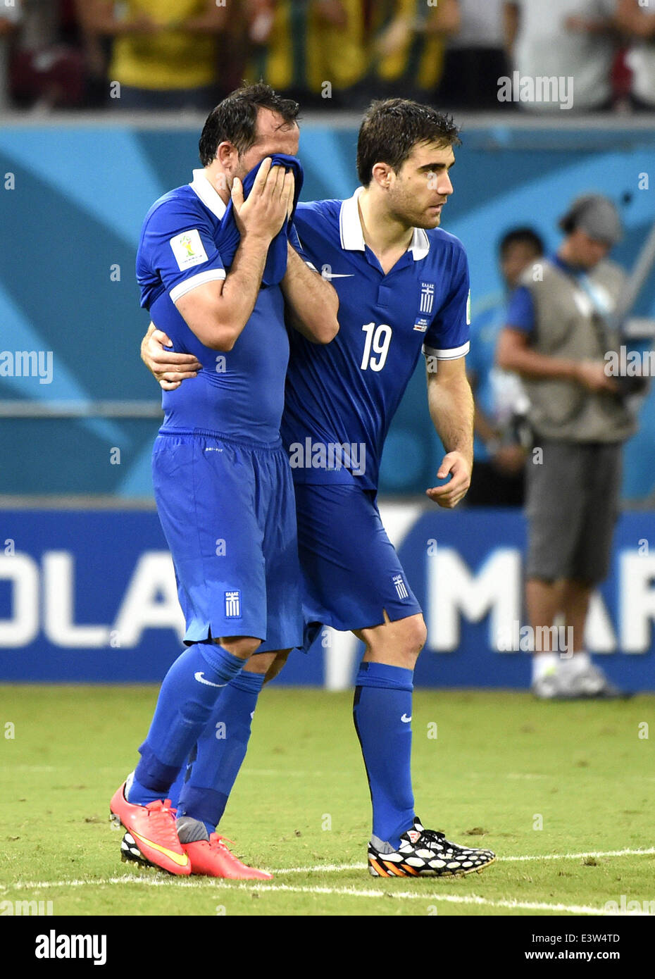 (140629) -- RECIFE, June 29, 2014 (Xinhua) -- Greece's Theofanis Gekas (L) reacts after missing a penalty kick during the penalty shoot-out of a Round of 16 match between Costa Rica and Greece of 2014 FIFA World Cup at the Arena Pernambuco Stadium in Recife, Brazil, on June 29, 2014. Costa Rica won 6-4 (5-3 in penalties) over Greece and qualified for quarter-finals on Sunday. (Xinhua/Lui Siu Wai)(pcy) Stock Photo