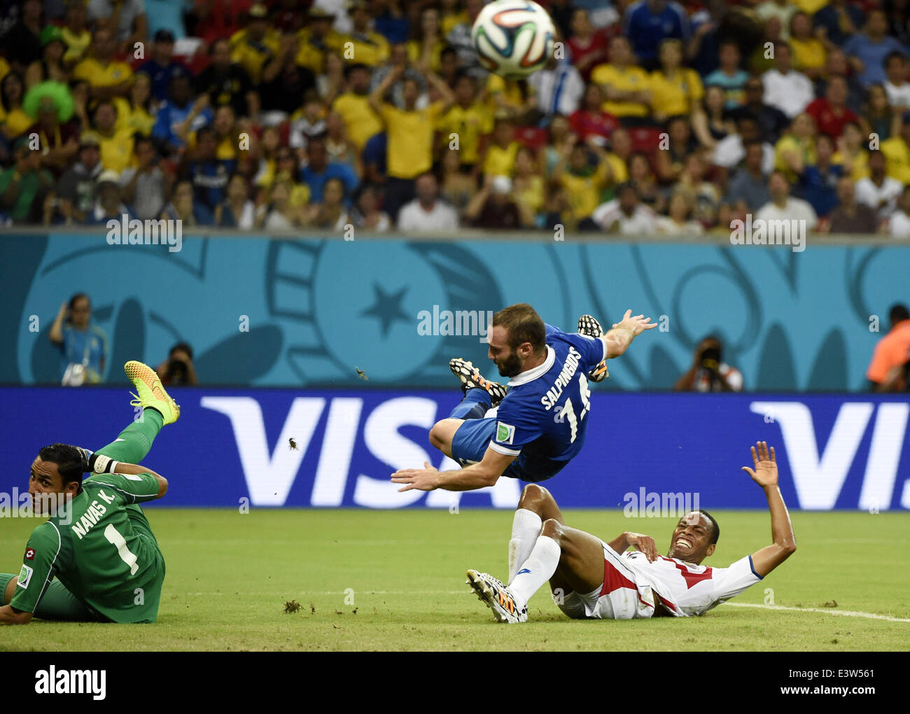 Recife, Brazil. 29th June, 2014. Costa Rica's Celso Borges (R) and goalkeeper Keilor Navas (R) defend against the attack of Greece's Dimitris Salpingidis during a Round of 16 match between Costa Rica and Greece of 2014 FIFA World Cup at the Arena Pernambuco Stadium in Recife, Brazil, on June 29, 2014. Credit:  Lui Siu Wai/Xinhua/Alamy Live News Stock Photo