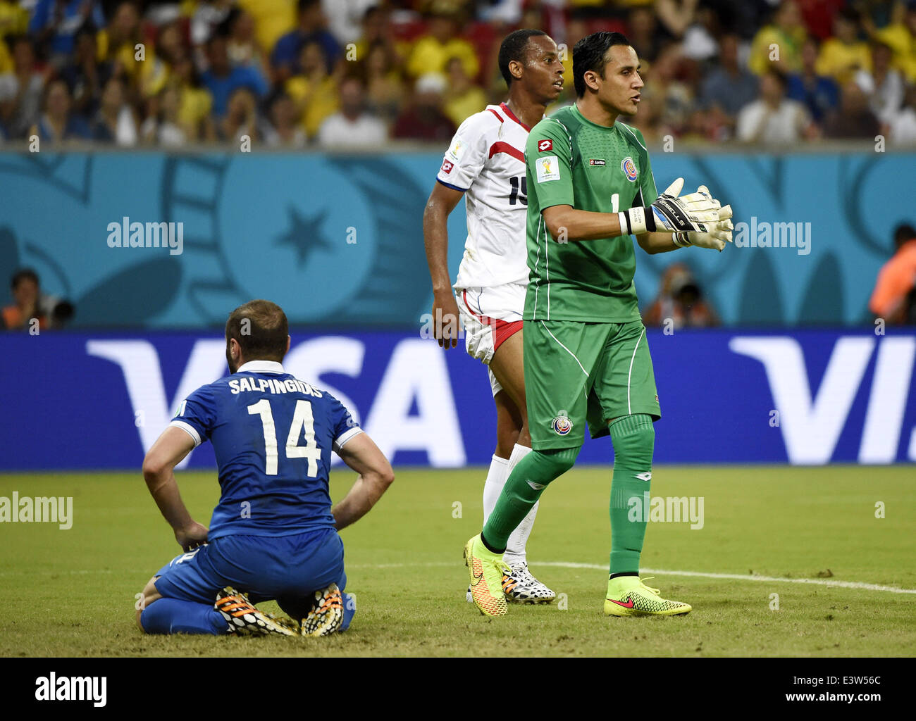 Recife, Brazil. 29th June, 2014. Greece's Dimitris Salpingidis (L) reacts as Costa Rica's Celso Borges (C) and goalkeeper Keilor Navas rescue the attack during a Round of 16 match between Costa Rica and Greece of 2014 FIFA World Cup at the Arena Pernambuco Stadium in Recife, Brazil, on June 29, 2014. Credit:  Lui Siu Wai/Xinhua/Alamy Live News Stock Photo