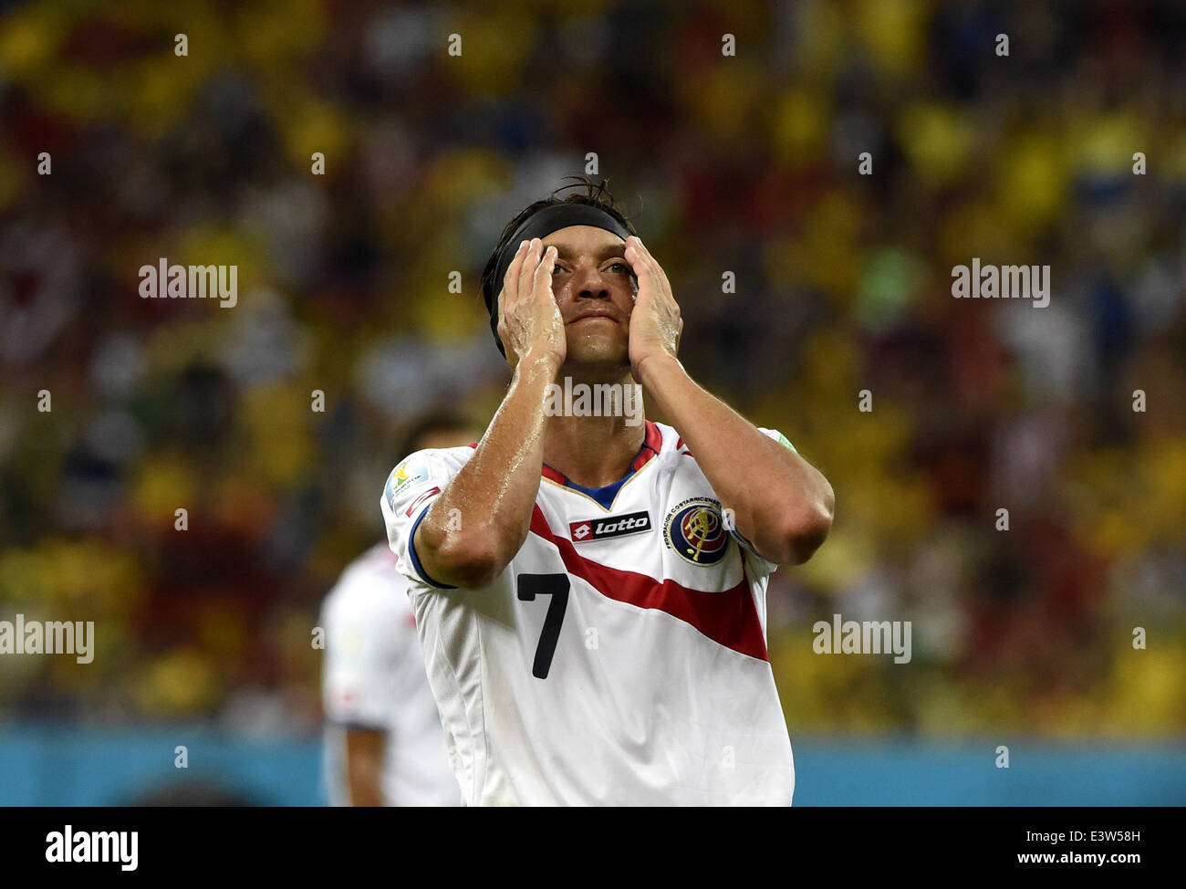 Recife, Brazil. 29th June, 2014. Costa Rica's Christian Bolanos reacts during a Round of 16 match between Costa Rica and Greece of 2014 FIFA World Cup at the Arena Pernambuco Stadium in Recife, Brazil, on June 29, 2014. Credit:  Lui Siu Wai/Xinhua/Alamy Live News Stock Photo