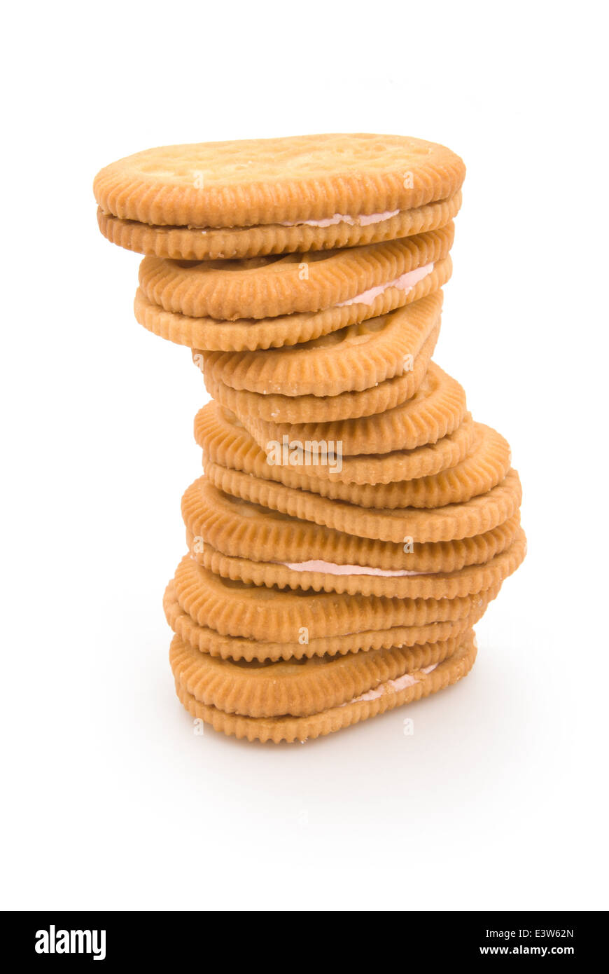 rotated sandwich biscuits with pink cream filling Stock Photo