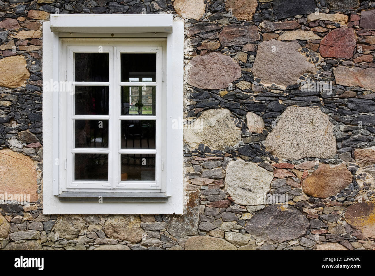 White old wooden rural window on stone home wall Stock Photo - Alamy