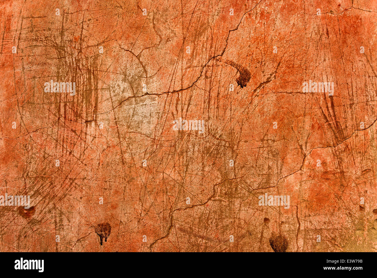 Grunge orange wall texture as urban background and copy space Stock