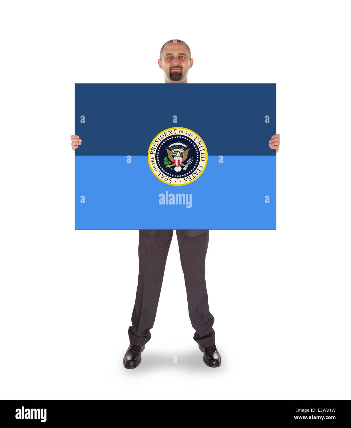 Businessman holding a big card, presidential seal, isolated on white Stock Photo