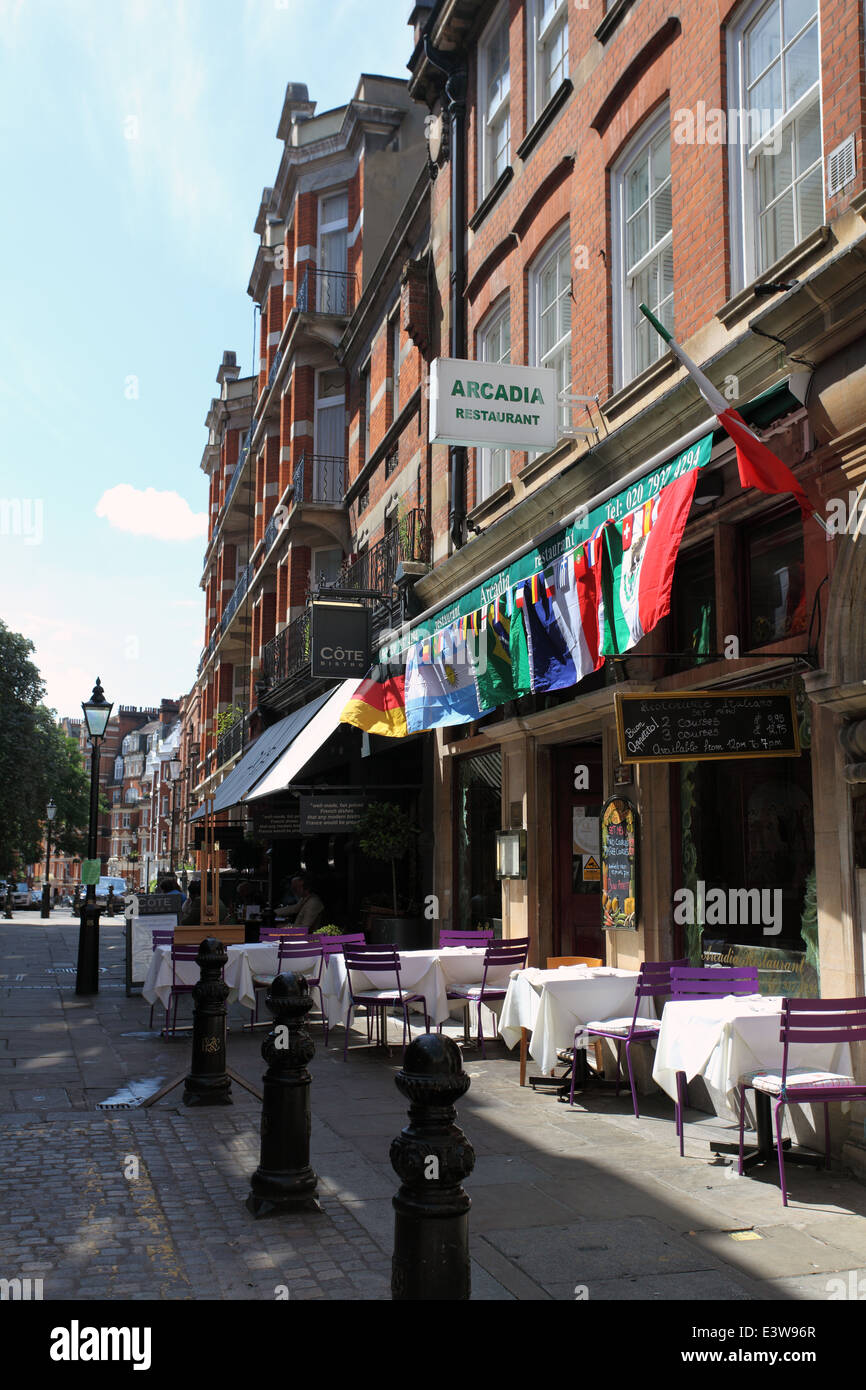 Arcadia and Cote restaurants in the heart of upmarket Kensington High Street, London W8 Stock Photo