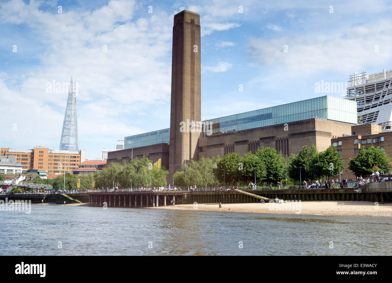Tate Modern (the disused Bankside power station) London. In the background you can see the shard Stock Photo