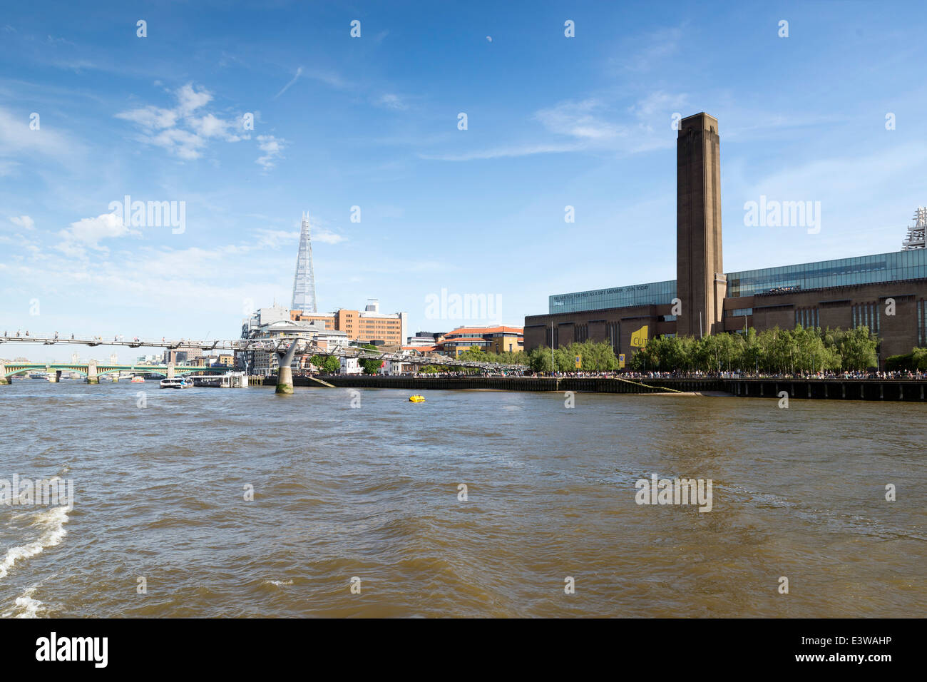 Tate Modern (the disused Bankside power station) London. In the background you can see the shard Stock Photo