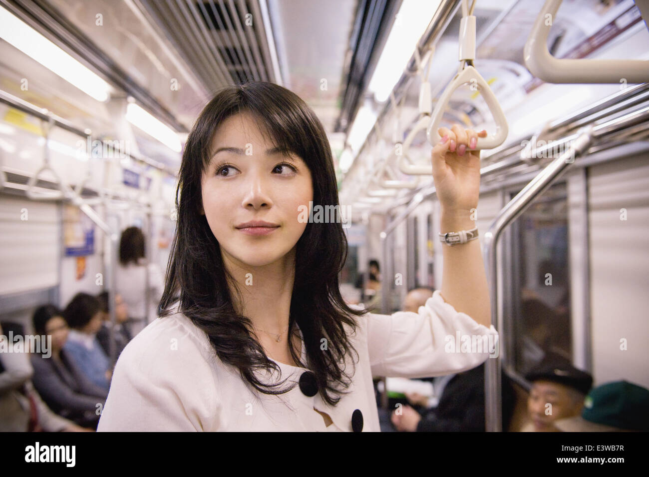 Woman on a train hi-res stock photography and images - Alamy