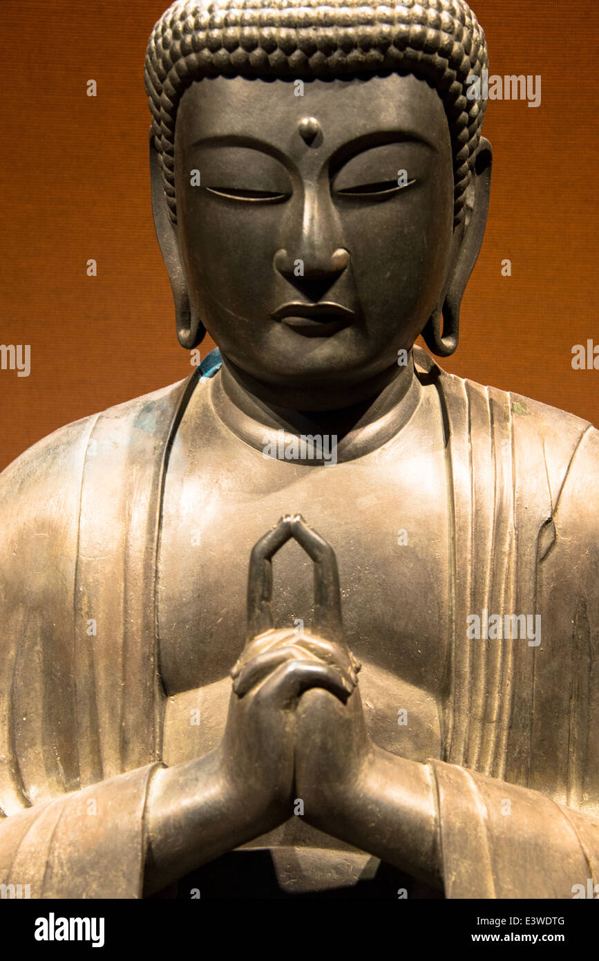 a bronze japanese buddha statue from 1648 in the ethnographic museum from leiden in holland
