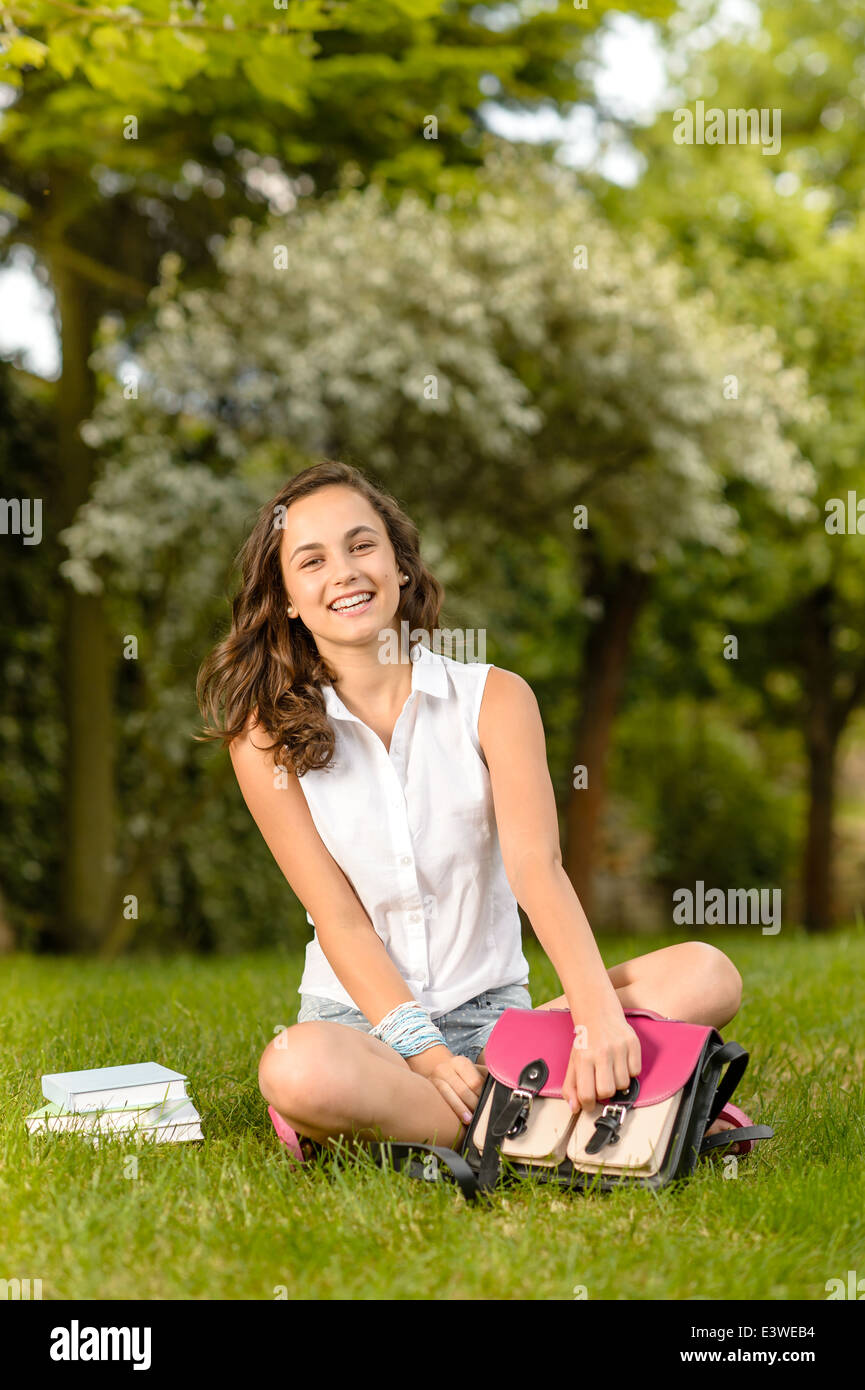 happy student girl with school bag and color folders Stock Photo - Alamy