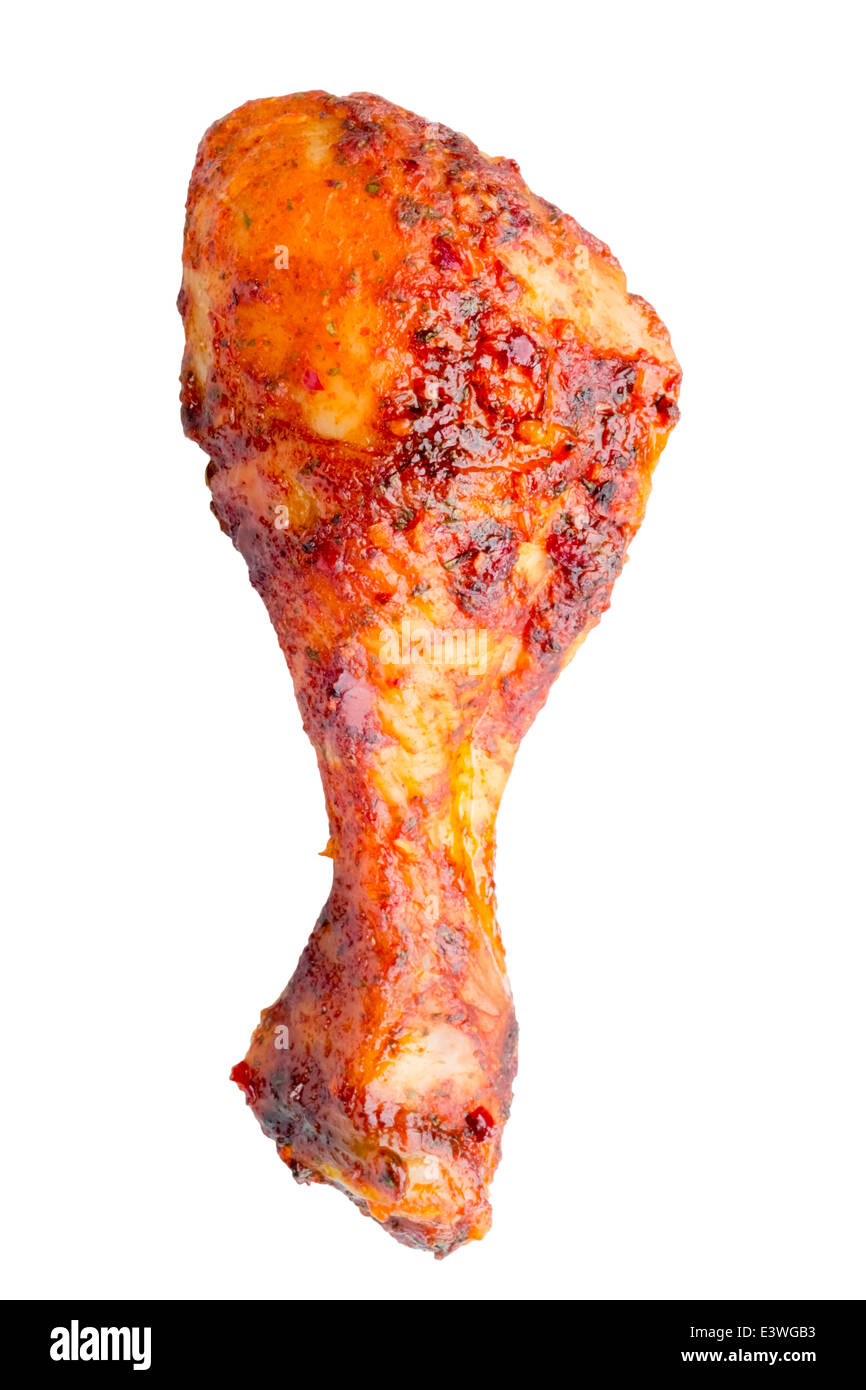 Chicken drumstick cooked with sweet chili sauce, isolated against a white background. Stock Photo