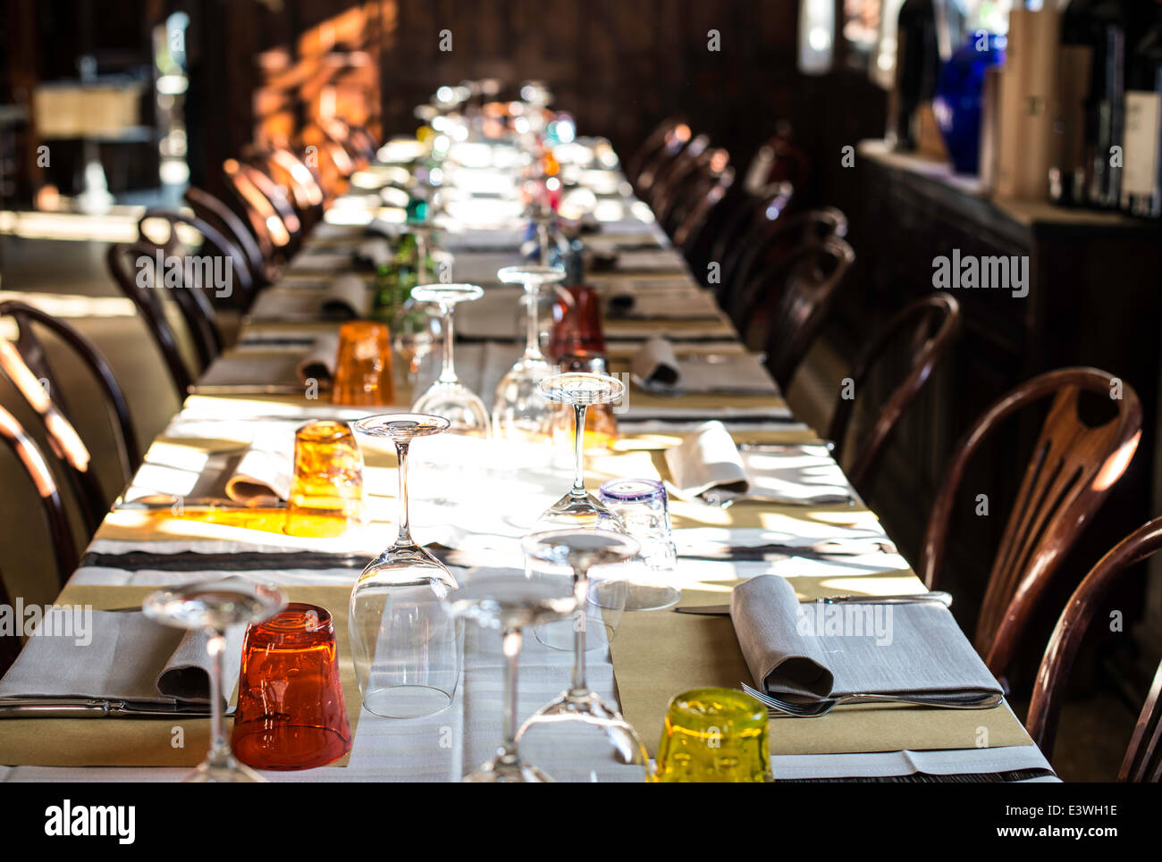 Table in an Italian restaurant. Wooden antique furniture Stock Photo
