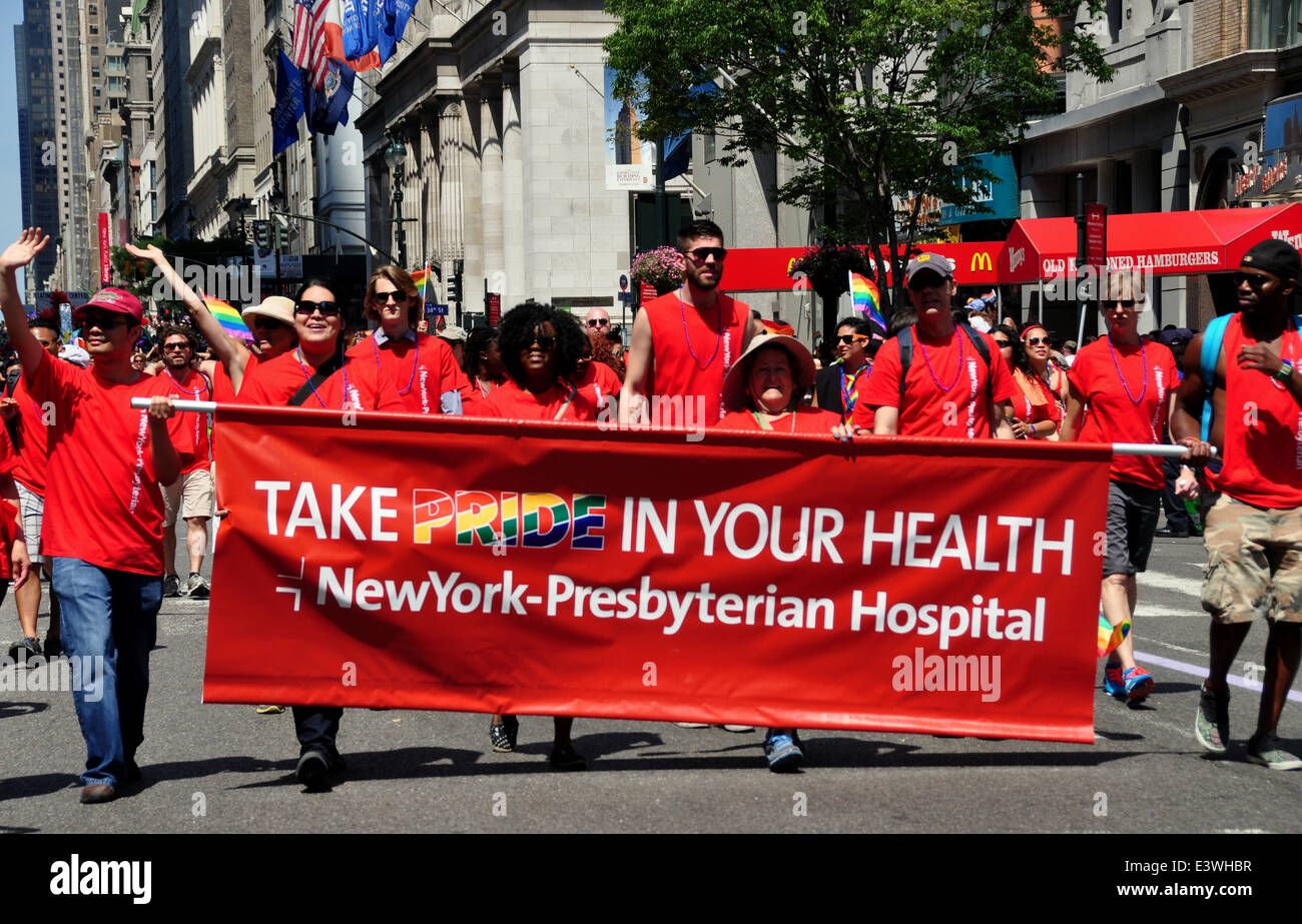 NYC: Health care workers from New York-Presbyterian Hospital marching behind their banner at the 2014 Gay Pride Parade on Fifth Stock Photo