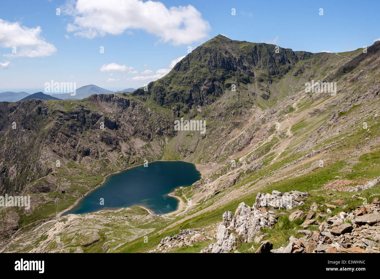 Mount Snowdon with Llyn Glaslyn lake below seen from Crib Goch on Snowdon Horseshoe in Snowdonia National Park (Eryri) North Wales UK Britain Stock Photo
