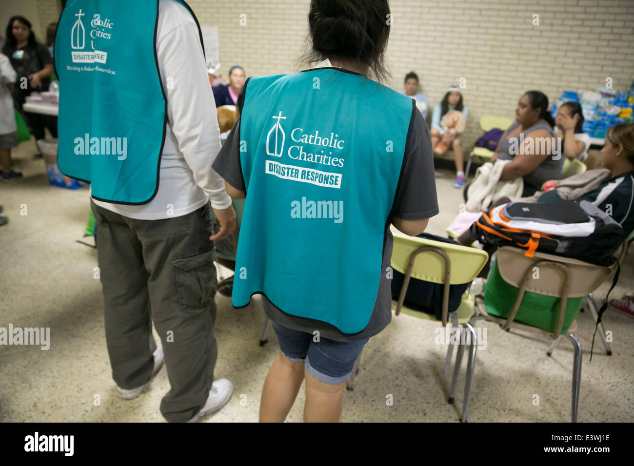 volunteers at Catholic Charity shelter in McAllen, Texas. Surge of immigrants from Central America crossed  Texas-Mexico border Stock Photo