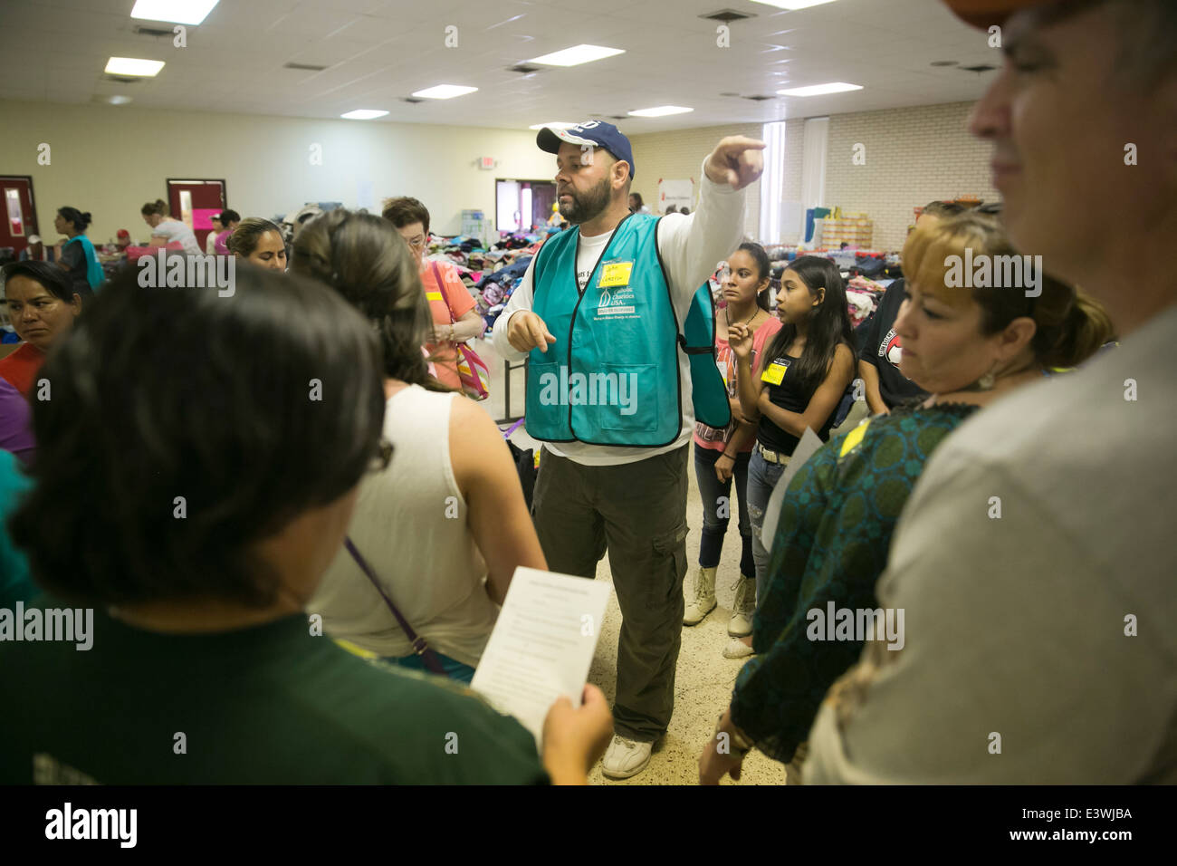 volunteers at Catholic Charity shelter in McAllen, Texas. Surge of immigrants from Central America crossed  Texas-Mexico border Stock Photo