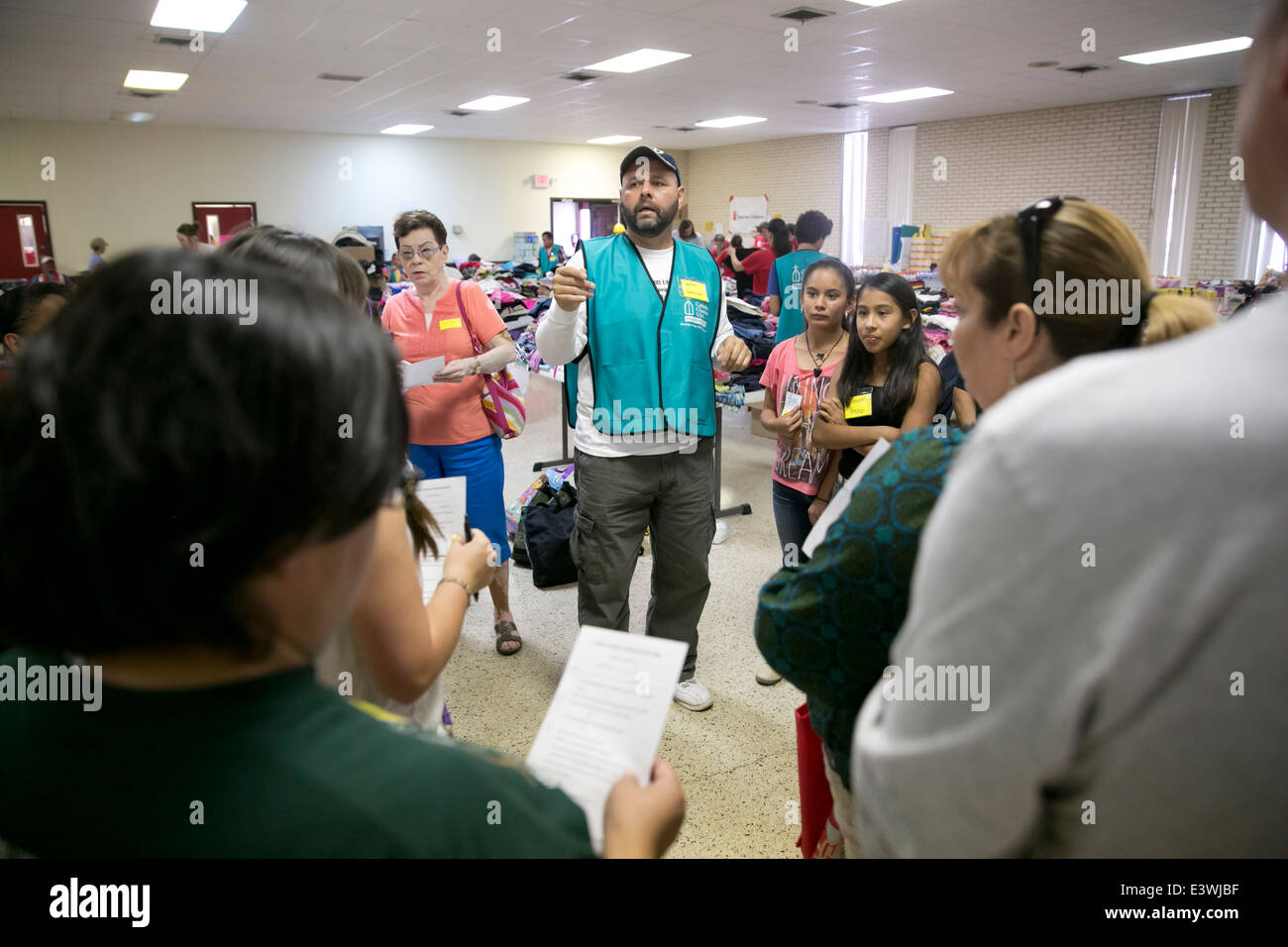 volunteers at Catholic Charity shelter in McAllen, Texas. Surge of immigrants from Central America crossed  Texas-Mexico border Stock Photo