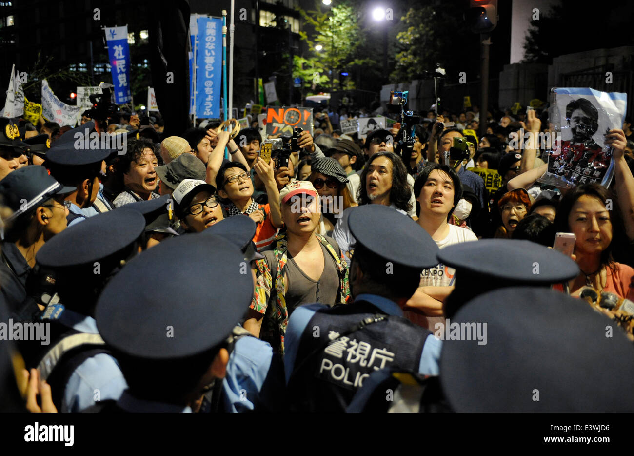 Tokyo, Japan. 30th June, 2014. People protest against the rights for ...