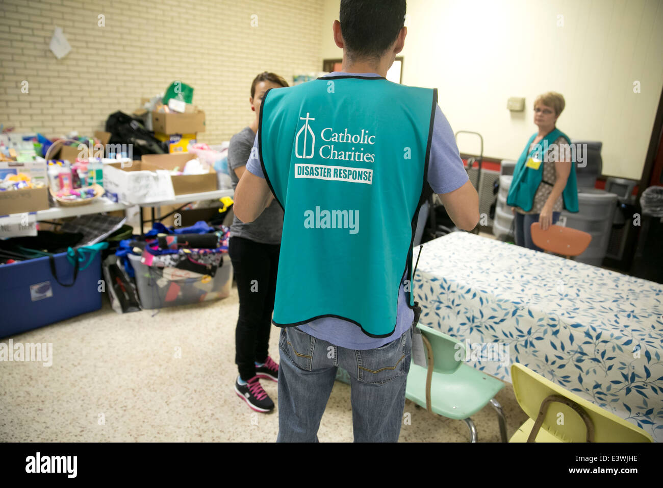 volunteers at Catholic Charity shelter in McAllen, Texas. Surge of immigrants from Central America crossed  Texas-Mexico border Stock Photo