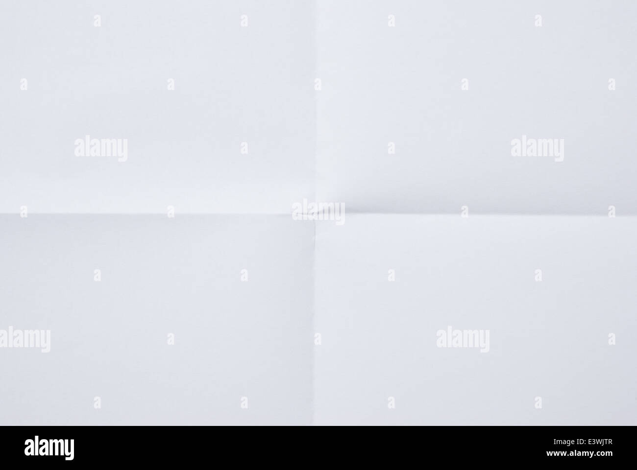 white sheet of paper folded in four Stock Photo