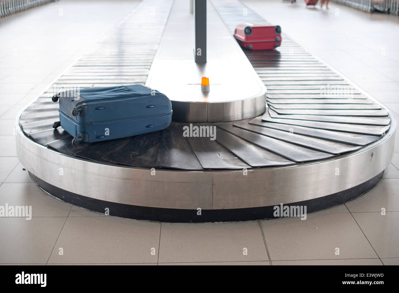 airport baggage carousel area with luggage Stock Photo