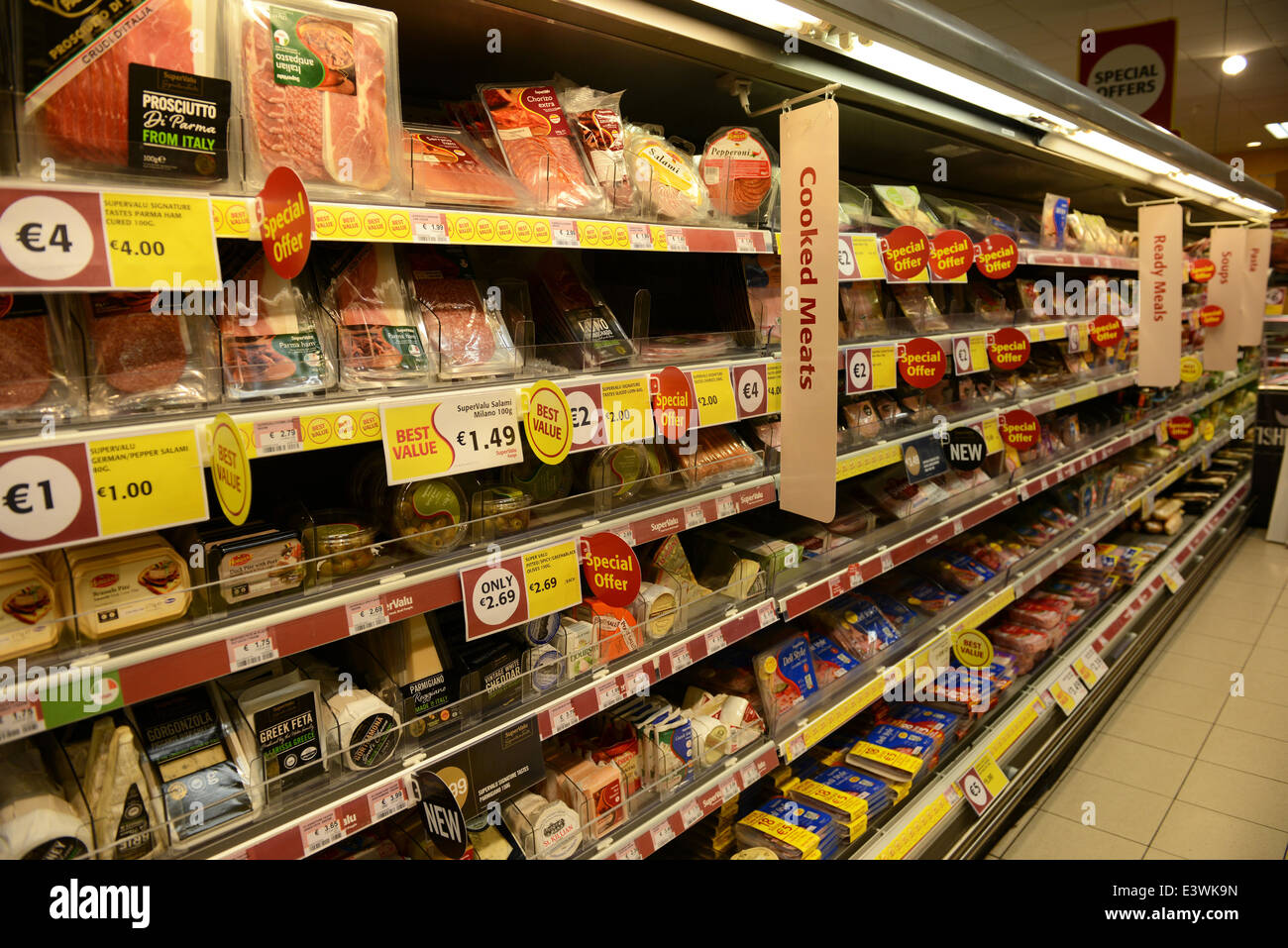 Supermarket aisle, cooked meats and cheese Stock Photo Alamy