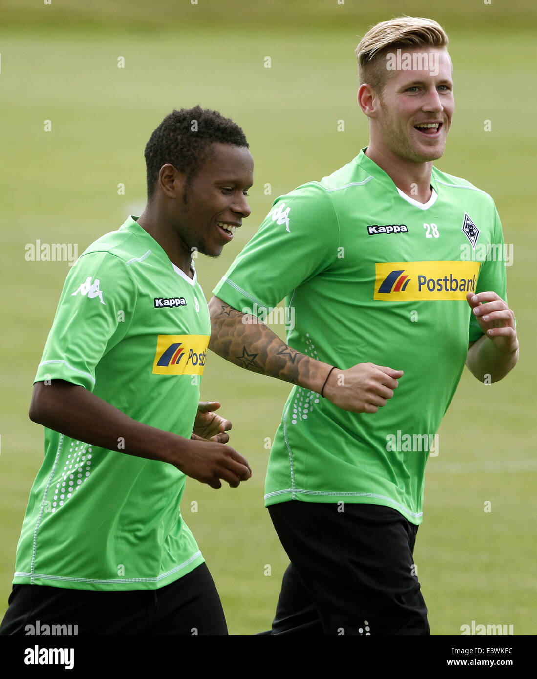 Moenchengladbach, Germany. 30th June, 2014. New players of Bundesliga soccer club Borussia Moenchengladbach, Ibrahima Traore (L) and Andre Hahn, attend the first preseason training of their team in Moenchengladbach, Germany, 30 June 2014. Photo: ROLAND WEIHRAUCH/DPA/Alamy Live News Stock Photo