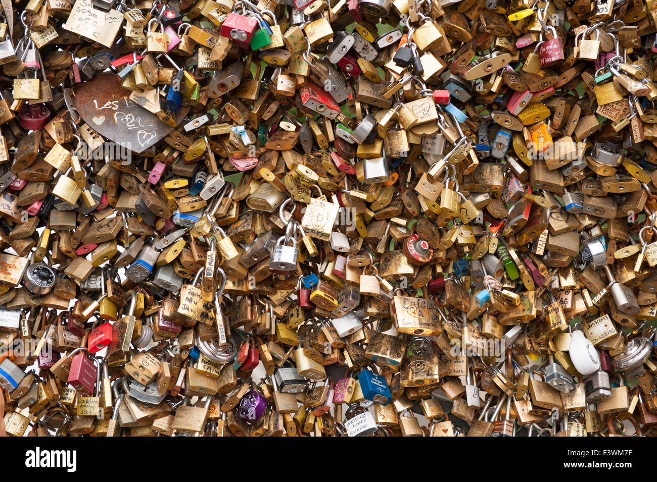 full frame image of locked padlocks or love locks on the pont des arts bridge in paris Stock Photo