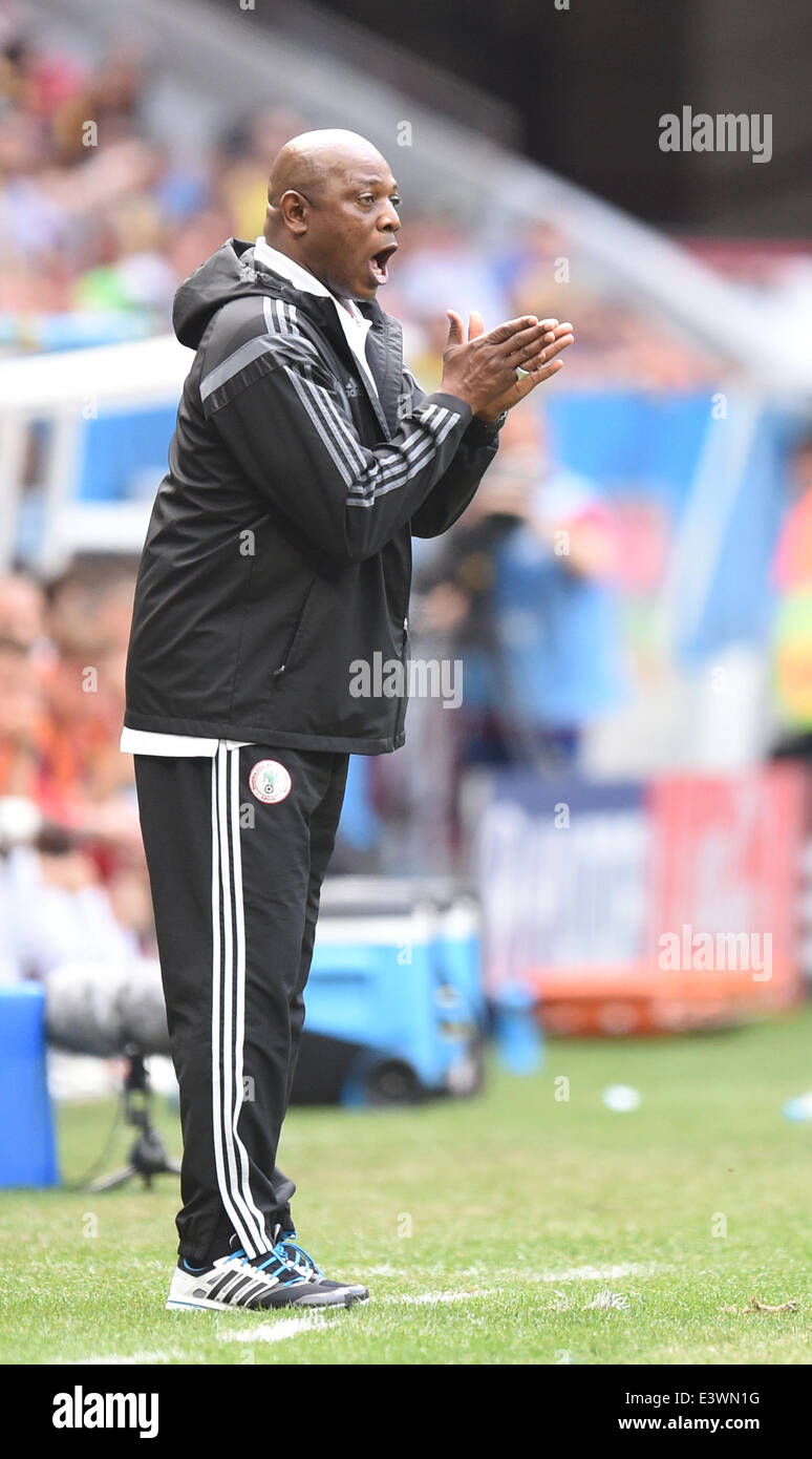 Brasilia, Brazil. 30th June, 2014. Head coach Stephen Keshi of Nigeria reacts during the FIFA World Cup 2014 round of 16 match between France and Nigeria at the Estadio National Stadium in Brasilia, Brazil, on 30 June 2014. Credit:  dpa picture alliance/Alamy Live News Stock Photo