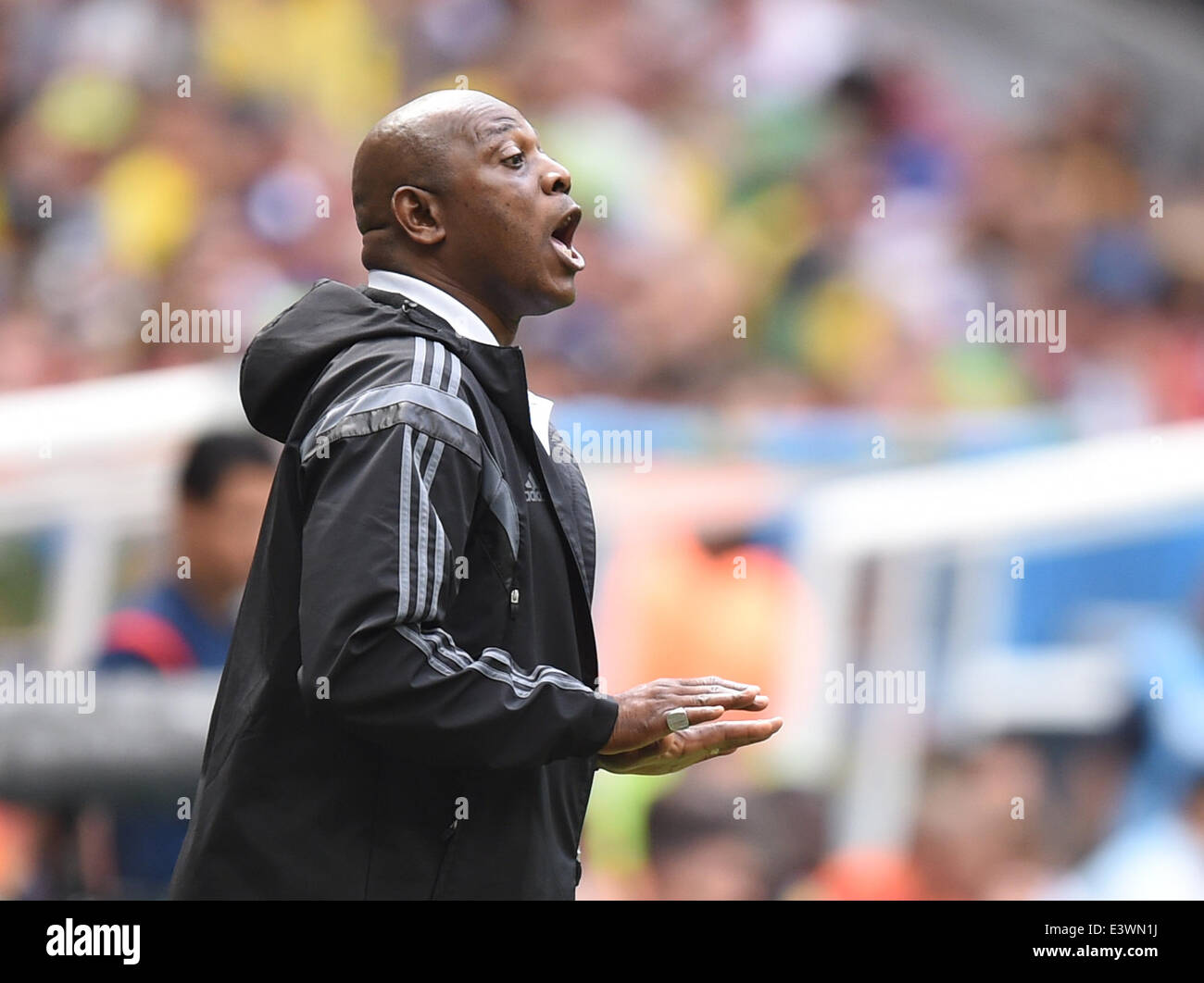 Brasilia, Brazil. 30th June, 2014. Head coach Stephen Keshi of Nigeria reacts during the FIFA World Cup 2014 round of 16 match between France and Nigeria at the Estadio National Stadium in Brasilia, Brazil, on 30 June 2014. Credit:  dpa picture alliance/Alamy Live News Stock Photo
