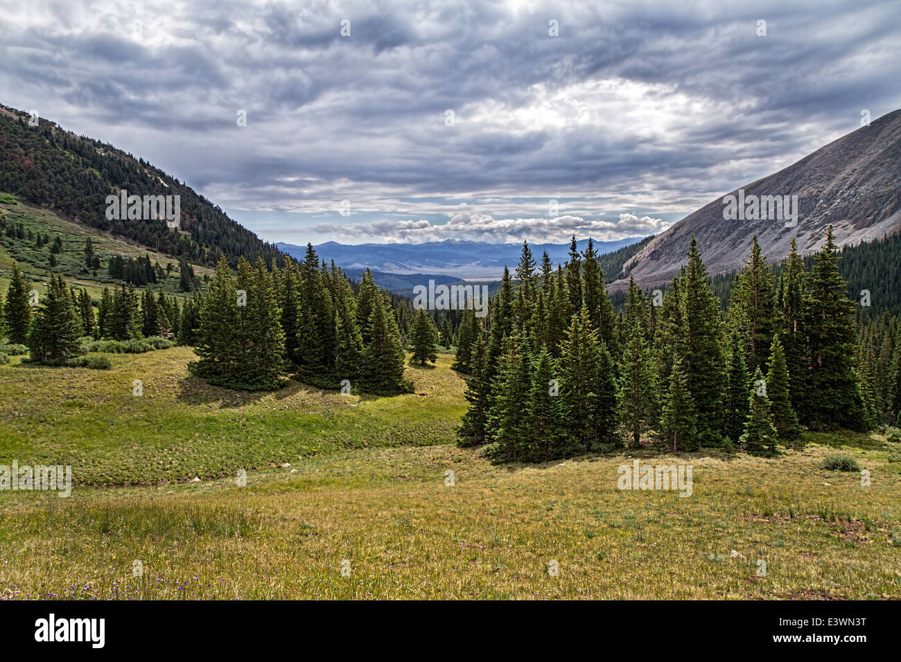 Colorado Mountain Valley View with Rain Clouds Stock Photo