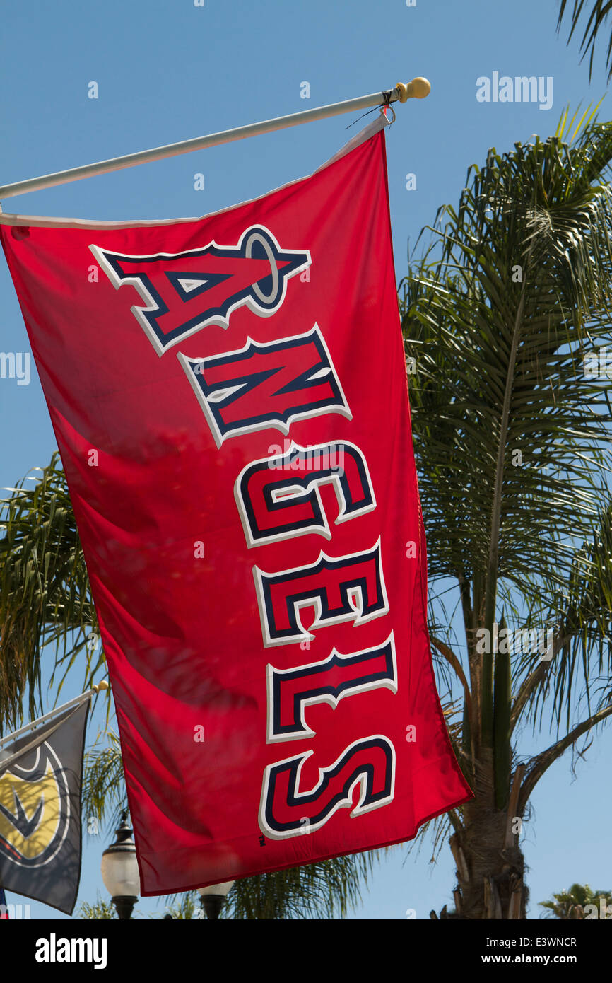 Angels baseball team flag against a blue sky with palm trees Stock