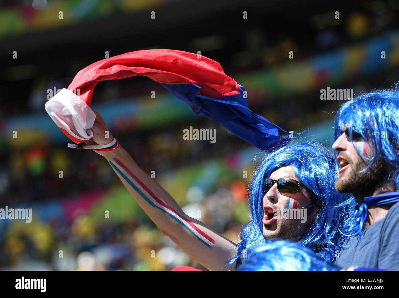 Brasilia, Brazil. 30th June, 2014. A France's fans pose before a Round of 16 match between France and Nigeria of 2014 FIFA World Cup at the Estadio Nacional Stadium in Brasilia, Brazil, on June 30, 2014. Credit:  Li Ming/Xinhua/Alamy Live News Stock Photo