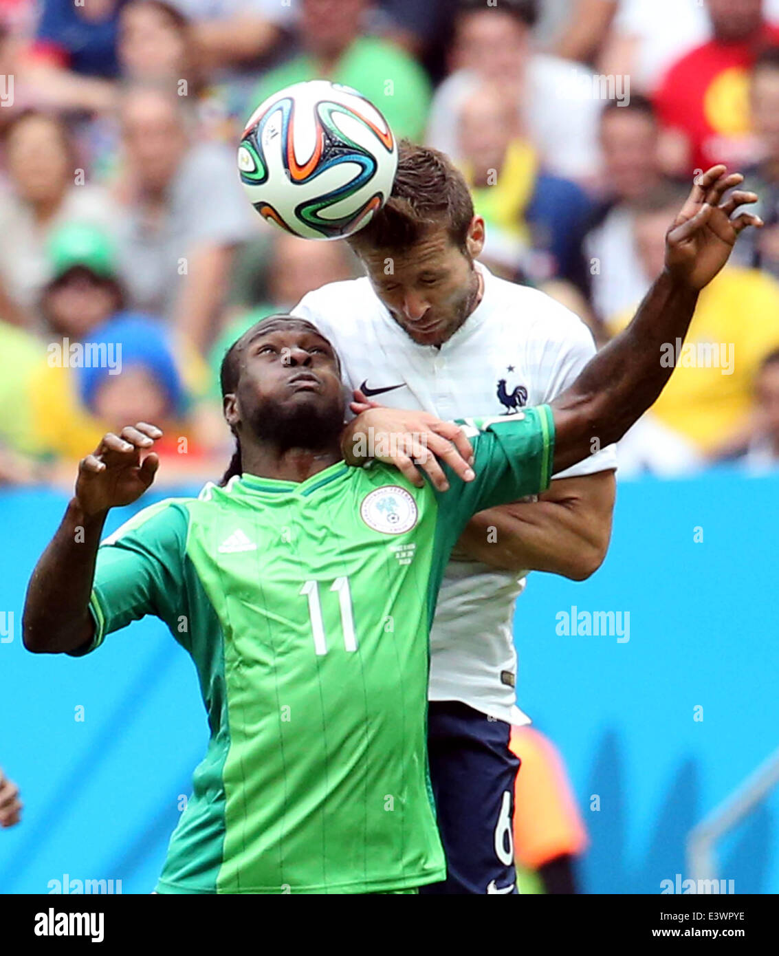 Brasilia, Brazil. 30th June, 2014. France's Yohan Cabaye vies with Nigeria's Victor Moses during a Round of 16 match between France and Nigeria of 2014 FIFA World Cup at the Estadio Nacional Stadium in Brasilia, Brazil, on June 30, 2014. Credit:  Xinhua/Alamy Live News Stock Photo