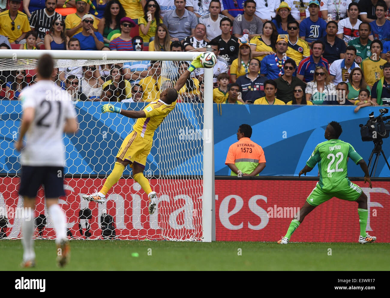 Brasilia, Brazil. 30th June, 2014. Goalkeeper Vincent Enyeama (C) of Nigeria catches the ball during the FIFA World Cup 2014 round of 16 match between France and Nigeria at the Estadio National Stadium in Brasilia, Brazil, on 30 June 2014. Credit:  dpa picture alliance/Alamy Live News Stock Photo