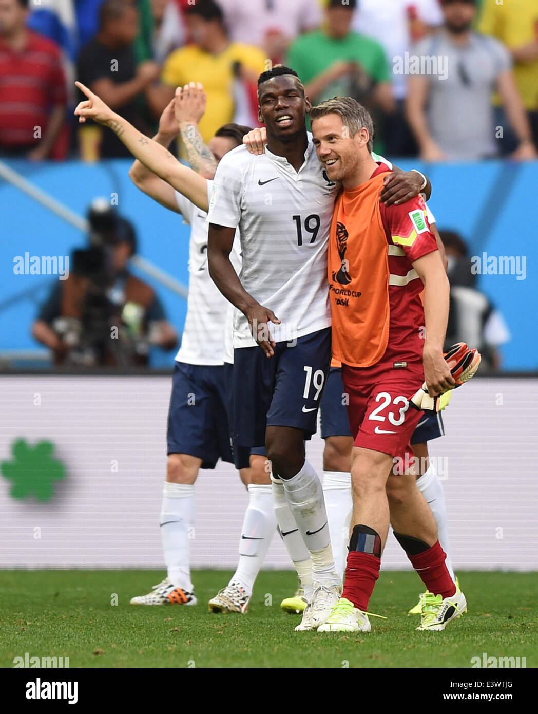 Brasilia, Brazil. 30th June, 2014. Paul Pogba (L) and goalkeeper Mickael Landreau of France celebrate after the FIFA World Cup 2014 round of 16 match between France and Nigeria at the Estadio National Stadium in Brasilia, Brazil, on 30 June 2014. Credit:  dpa picture alliance/Alamy Live News Stock Photo