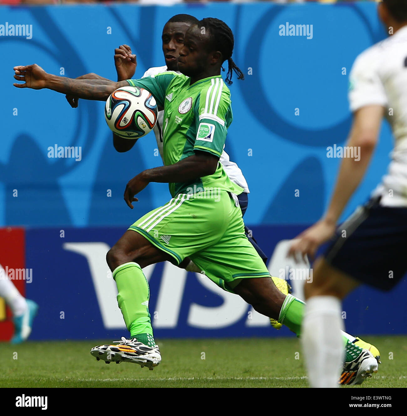 Brasilia, Brazil. 30th June, 2014. Nigeria's Victor Moses vies for the ball during a Round of 16 match between France and Nigeria of 2014 FIFA World Cup at the Estadio Nacional Stadium in Brasilia, Brazil, on June 30, 2014. Credit:  Liu Bin/Xinhua/Alamy Live News Stock Photo