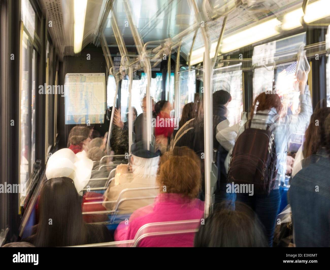 Passengers Riding Inside Public Bus, NYC, USA Stock Photo
