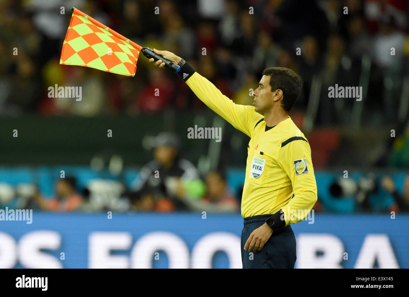 Porto Alegre, Brazil. 30th June, 2014. Assistant referee Marcelo van Gasse of Brazil seen during the FIFA World Cup 2014 round of 16 soccer match between Germany and Algeria at the Estadio Beira-Rio in Porto Alegre, Brazil, 30 June 2014. Photo: Marcus Brandt/dpa/Alamy Live News Stock Photo