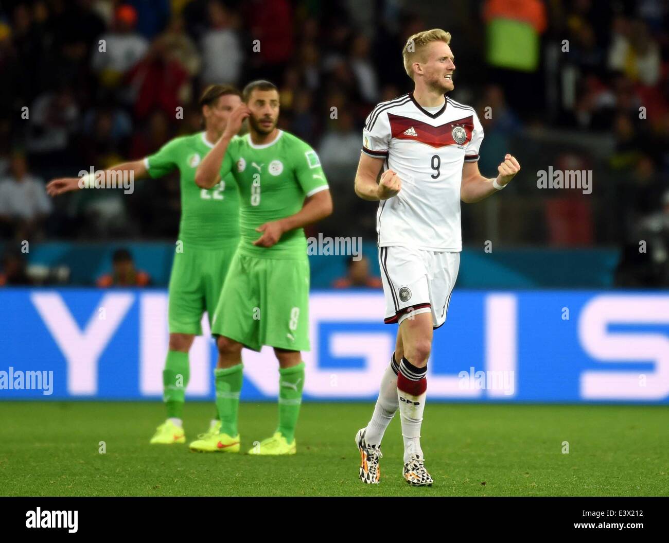 Porto Alegre, Brazil. 30th June, 2014. Germany's Andre Schurrle (R) celebrates a goal during the extra time of a Round of 16 match between Germany and Algeria of 2014 FIFA World Cup at the Estadio Beira-Rio Stadium in Porto Alegre, Brazil, on June 30, 2014. Credit:  Li Ga/Xinhua/Alamy Live News Stock Photo