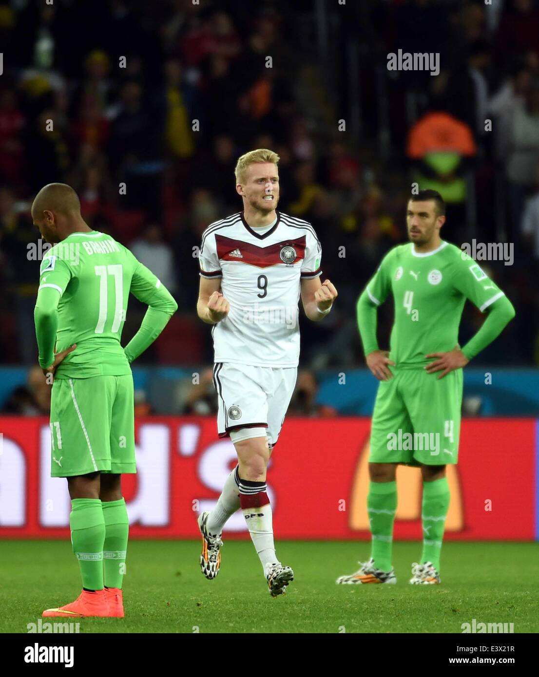Porto Alegre, Brazil. 30th June, 2014. Germany's Andre Schurrle (C) celebrates a goal during the extra time of a Round of 16 match between Germany and Algeria of 2014 FIFA World Cup at the Estadio Beira-Rio Stadium in Porto Alegre, Brazil, on June 30, 2014. Credit:  Li Ga/Xinhua/Alamy Live News Stock Photo