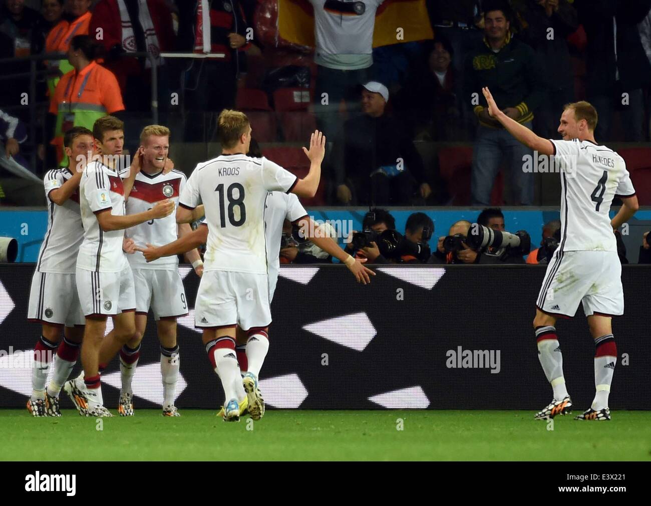 Porto Alegre, Brazil. 30th June, 2014. Germany's Andre Schurrle (3rd L) celebrates a goal during the extra time of a Round of 16 match between Germany and Algeria of 2014 FIFA World Cup at the Estadio Beira-Rio Stadium in Porto Alegre, Brazil, on June 30, 2014. Credit:  Li Ga/Xinhua/Alamy Live News Stock Photo