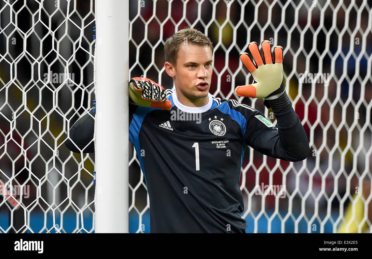 Porto Alegre, Brazil. 30th June, 2014. Germany's goalkeeper Manuel Neuer gestures during the FIFA World Cup 2014 round of 16 soccer match between Germany and Algeria at the Estadio Beira-Rio in Porto Alegre, Brazil, 30 June 2014. Photo: Marcus Brandt/dpa/Alamy Live News Stock Photo