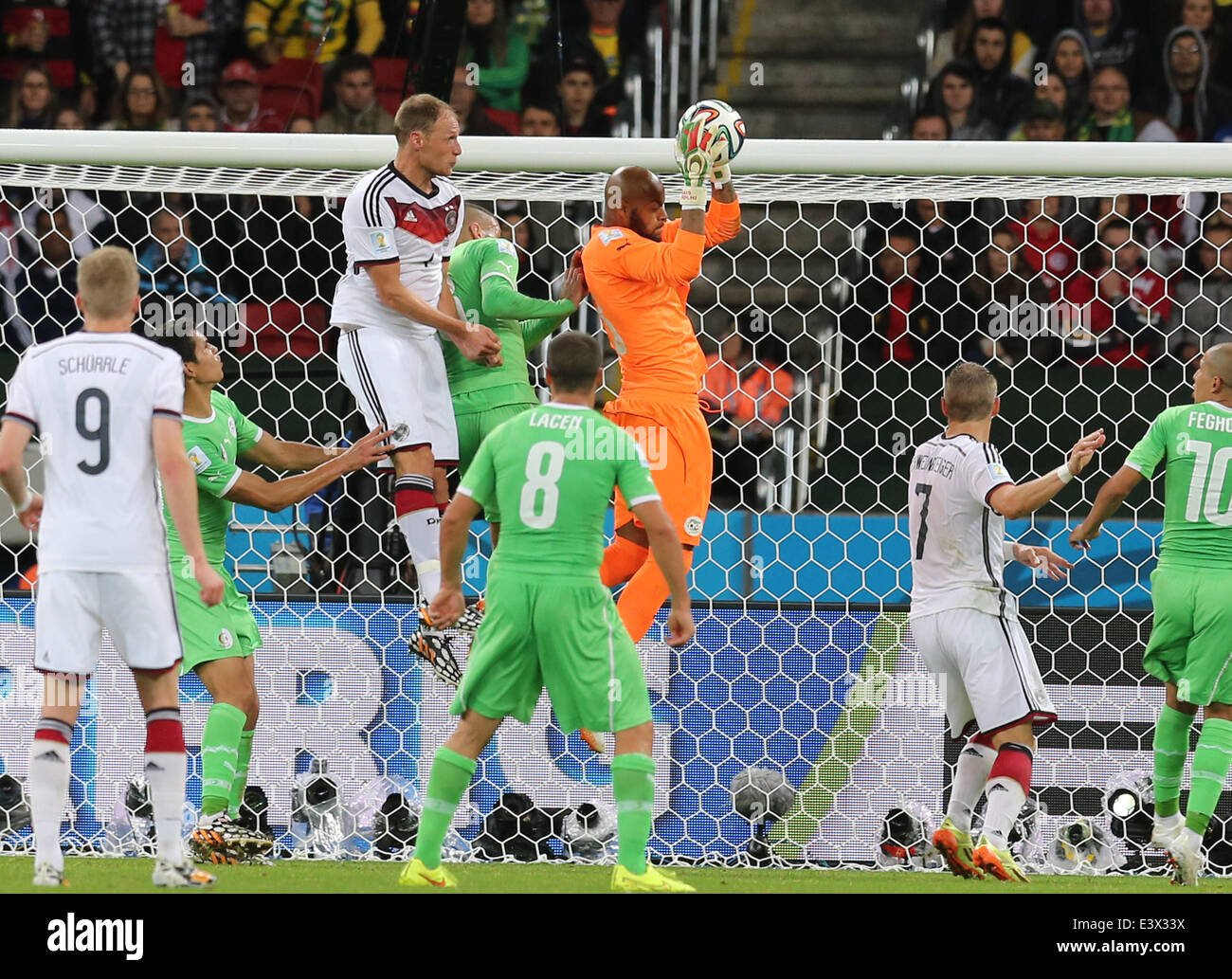Porto Alegre, Brazil. 30th June, 2014. World Cup 2nd Round. Germany versus Algeria. Mbohli takes the ball against Howedes Credit:  Action Plus Sports/Alamy Live News Stock Photo