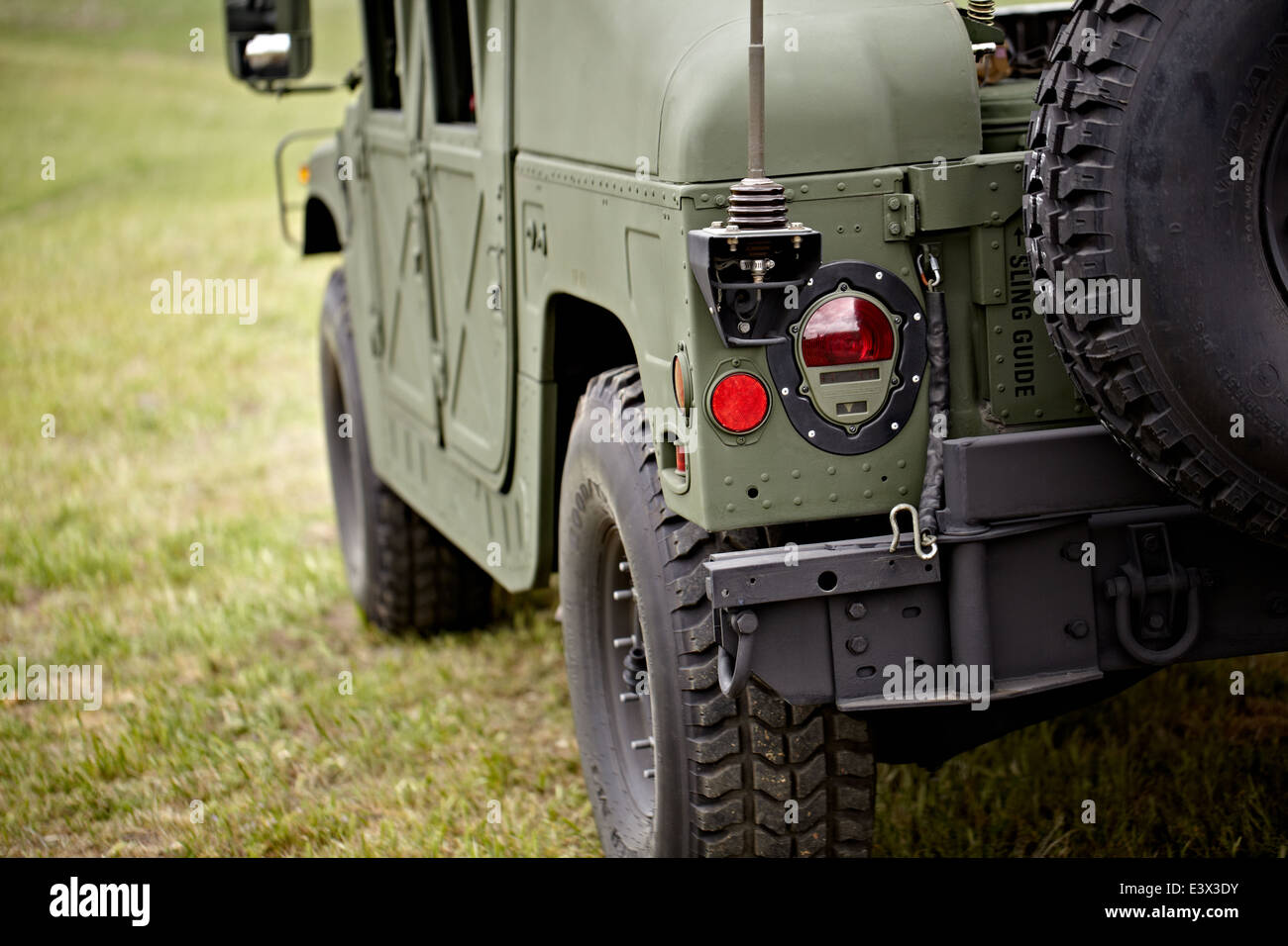 Detail of humvee tires and antennae rig. Stock Photo