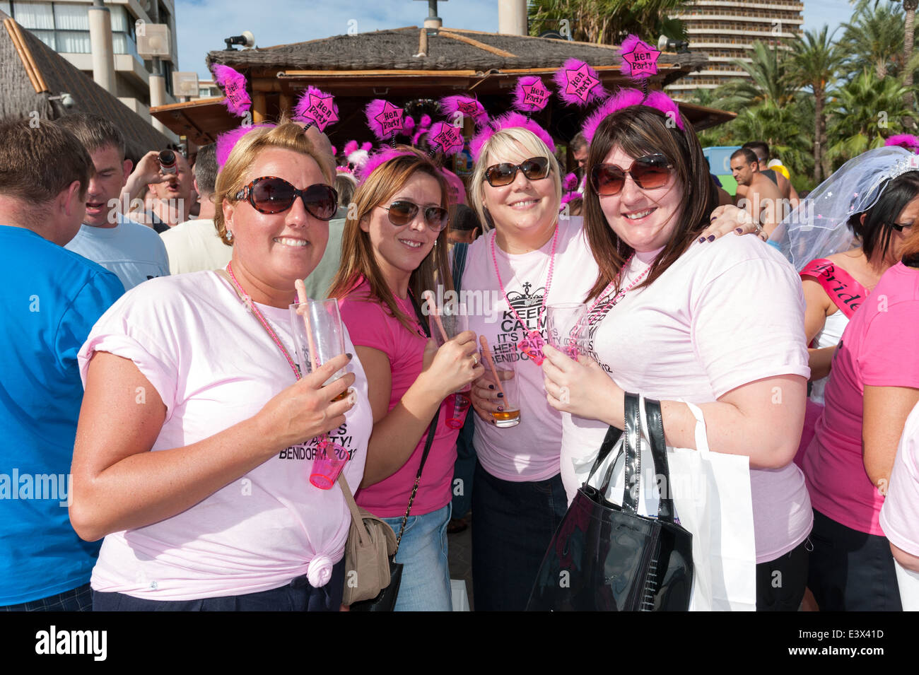Group of British women on hen weekend drinking at bar on the waterfront, Benidorm, Costa Blanca, Spain Stock Photo